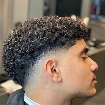 Why the Mid Fade Curly Hair Cut Is Dominating Barbershops Everywhere This Season